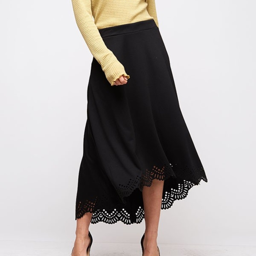 A black low-high midi skirt